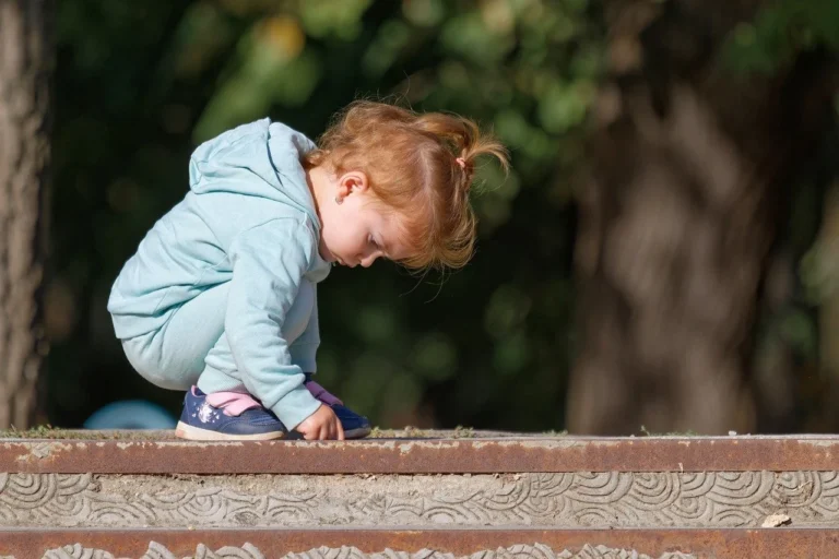 child and parent playing