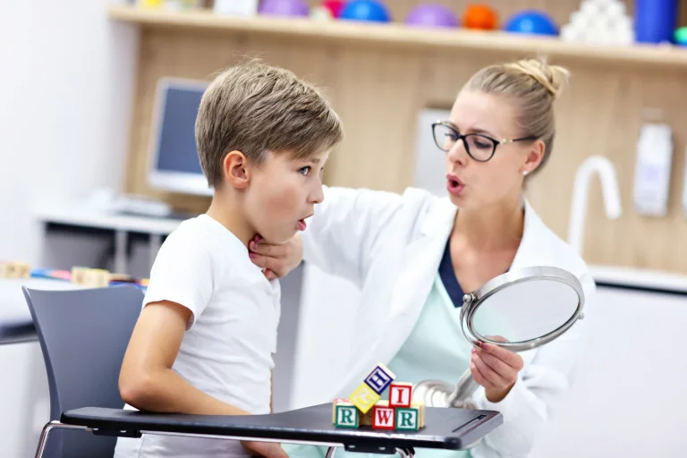 cute little boy speech therapist office 50 1 50